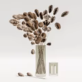 Transparent Glass Vase With Brown Dried Flowers And White Candle Decoration