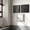 Modern Geometric Wall Decor in Dark and Light Gray Hanging on White Wall