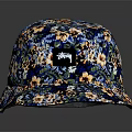 Stylish Blue Floral Pattern Bucket Hat with Decorative Logo and Colorful Design