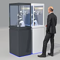 Businessman Observes Modern Commercial Equipment In Display Cabinets With Robotic Arms