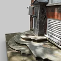 Stone Fountain With Stepped Base Against Brick Wall And White Framed Windows