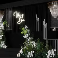 Elegant Wedding Stage Design With Crystal Chandeliers White Flowers And Mr Mrs Signage