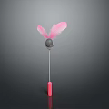 Adorable Cat Playing With Pink Feather Toy Wand For Fun Playtime