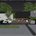 Evening Courtyard Garden with Wooden Deck Fire Pit Seating Lush Green Plants and Round Lighting