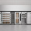 Professional Stainless Steel Kitchen Appliances Including Ovens Refrigerators and Storage Cabinets in Modern Commercial Design