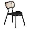 Black Modern Dining Chair With Woven Backrest And Sleek Design