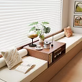Cozy Bay Window Cabinet with Window Blinds Green Plants Throw Pillows and Small Table