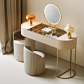 Modern Dressing Table With Golden Frame Round Mirror Orange Lamp And Beige Stools
