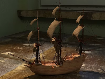 Wooden Sailboat Model With Multiple Sails And Detailed Hull On Indoor Floor 3d model