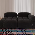 Black Plush Double Sofa In Modern Living Room With Colorful Area Rug