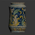 Colorful Decorative Jar With Blue Yellow White Patterns And Portrait Figure