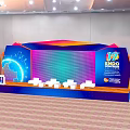 Modern Functional Desk Setup At Expo Congress 17 With Gradient Background And Seating