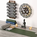 Yoga Sports Equipment Collection with Rolled Mats Wall Hanging and Meditation Accessories