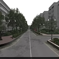 Commercial Street Night View With Lush Green Plants Surrounding Modern Buildings And Warm Lighting