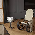 Elegant Beige Black Rocking Chair with Wicker Design Blanket Small Table and Wooden Floor
