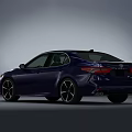 Sleek Blue Sedan Featuring Sporty Alloy Wheels And Aerodynamic Body Design