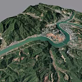 Aerial View Of Mountainous Terrain With Winding River And Urban Settlement