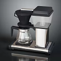 Sleek Black And Silver Coffee Maker Kitchen Appliance With Glass Carafe And Transparent Water Tank