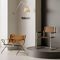 Modern Brown Leather Chairs With Metal Frame By Molteni&C With Floor Lamp And Grey Wall