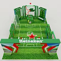 Heineken Themed Football Exhibition Setup With Green Grass Goalposts And Soccer Ball