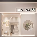 Elegant Cream Style Kids Clothing Store Interior Design With Warm Lighting And Tidy Garment Displays