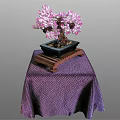 Pink Flowering Bonsai Tree in Dark Square Pot on Wooden Tray with Purple Dotted Tablecloth