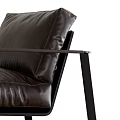 Modern Single Sofa With Leather Upholstery And Black Metal Frame Design