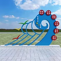Blue Wave Shaped Garden Ornament With Red Circular Decorations And Colorful Ribbons On Outdoor Lawn