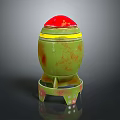 Green Barrel Shaped Weapon With Red Top Yellow Stripe Base Stand And Red Surface Spots
