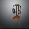 Gray Over Ear Headphones On Red Rusted Metal Stand With Stable Base