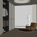 Modern Walk In Closet Interior With Glass Doors Hanging Clothes And Brown Armchair