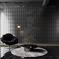 Black Accent Chair With Round Coffee Table Plant Against Perforated Metal Wall And Round Rug