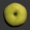 Fresh Yellow Apple With Shiny Surface On Dark Background For Healthy Snack