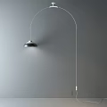 Modern Arc Design Wall Lamp With Black Shade Mounted On Gray Indoor Wall