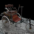 Vintage Tricycle With Wooden Seat Metal Frame And Large Wheels On Stone Pavement