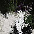 Elegant Floral Arch Decoration With White Purple Flowers And Feather Ornaments