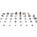 Natural Stone Collection Featuring Various Colors And Diverse Shapes On White Background