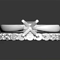 Elegant Platinum Diamond Ring With Central Stone And Side Accent Diamonds