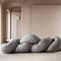 Gray Soft Fabric Abstract Shaped Sofa in Minimalist Interior With Bright Light and Wall Clock