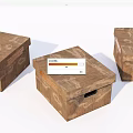 Three Brown Wooden Storage Boxes With Handles And Decorative Patterns