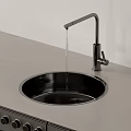 Modern Kitchen Faucet With Water Dripping Into Black Sink On Gray Countertop