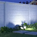 Garden Landscape Design with White Fence Green Plants Stone Slabs and Lush Lawn