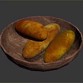 Three Golden Brown Roasted Sweet Potatoes in Wooden Plate on Dark Background