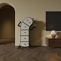 White Unique Design Chest of Drawers with Tray and Small Plant in Living Room