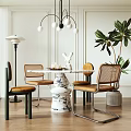 Elegant Dining Table Set With Marble Top Wicker Chairs Chandelier And Green Plant