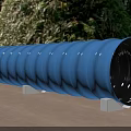 Construction Site Blue Corrugated Pipe with Support Blocks on Ground and Trees Background
