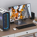 Modern Desktop Computer Setup with Monitor Case Keyboard Mouse and Speakers on Wooden Desk