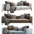 Modern Two Seater Sofa With Plaid Blanket And Checkered Pillows In Neutral Tones