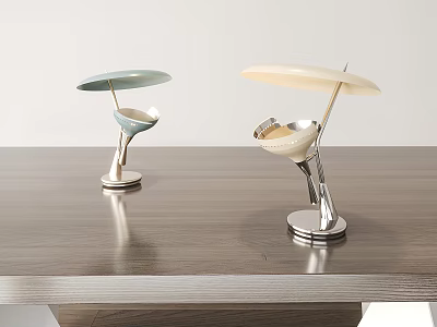 Two Stylish Modern Table Lamps with Metal Bases and Colored Shades on Wooden Table 3d model