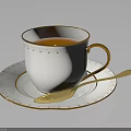 White Teacup With Gold Rim And Decorations On Matching Saucer With Gold Spoon